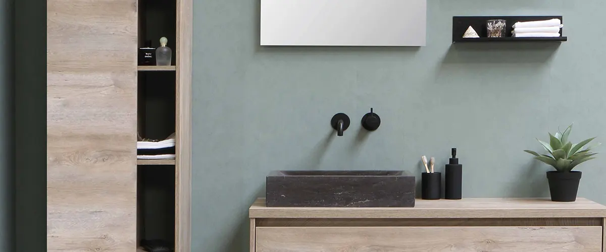 wooden vanity with black sink