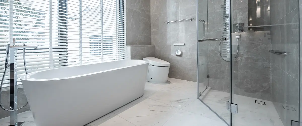 A tub and walk-in glass shower in a large bathroom