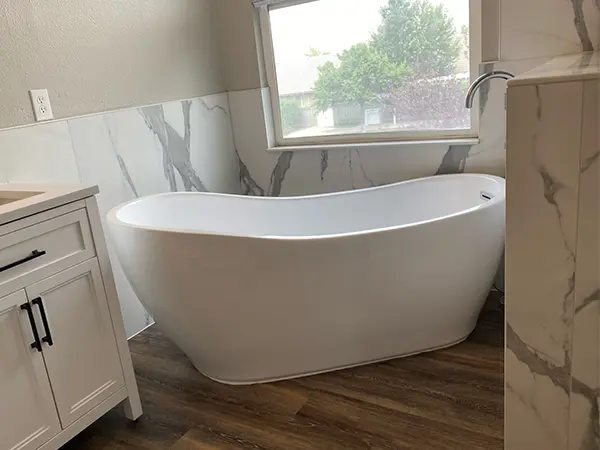 Freestanding tub in bathroom
