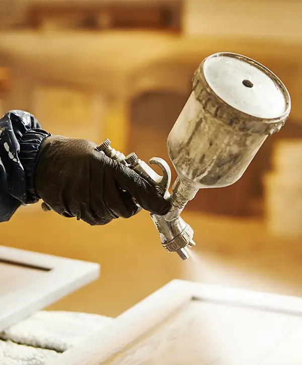 Painting kitchen cabinets with a sprayer