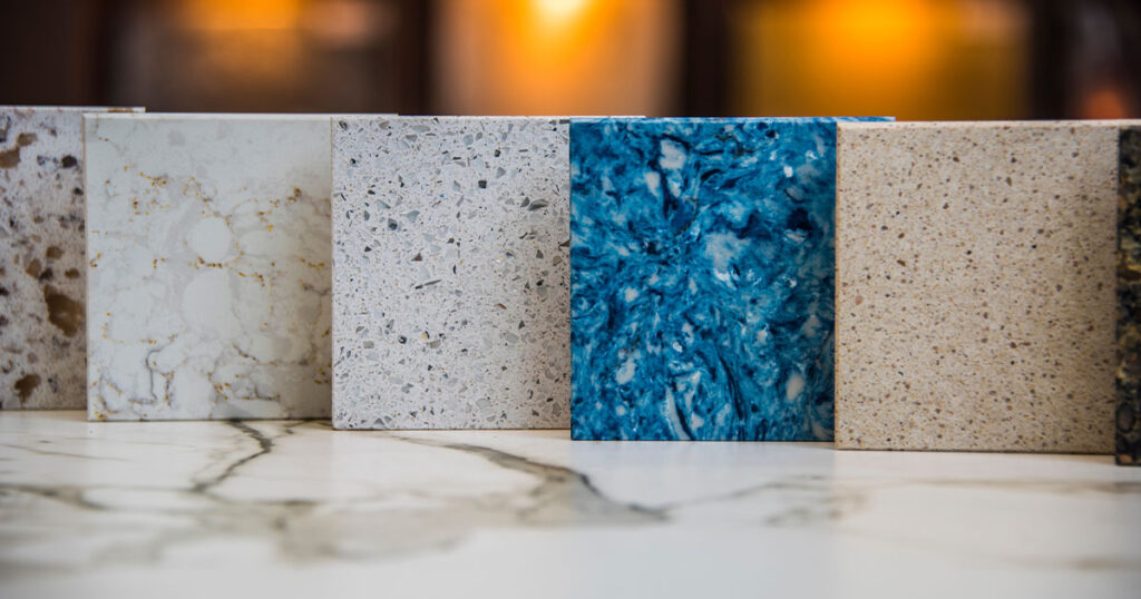 granite vs marble, five square samples of kitchen countertops white brown, blue, white gray, withe with grans on kitchen countertops surface of marble stone