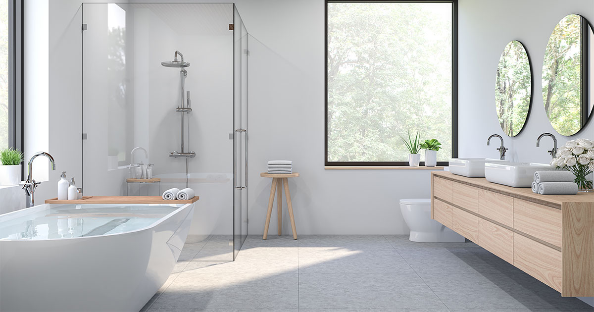 Modern contemporary loft bathroom. There are concrete tile floor, white wall .There are large windows look out to see the nature view.