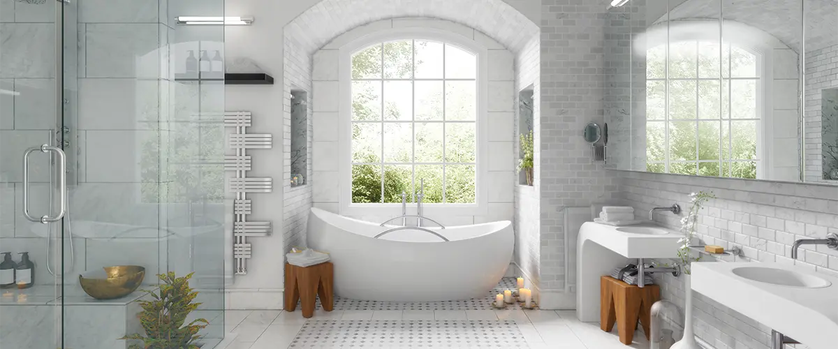 Upscale white bathroom in in white with bathtub and walk in shower.